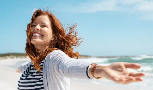 A smiling and carefree Middle aged woman