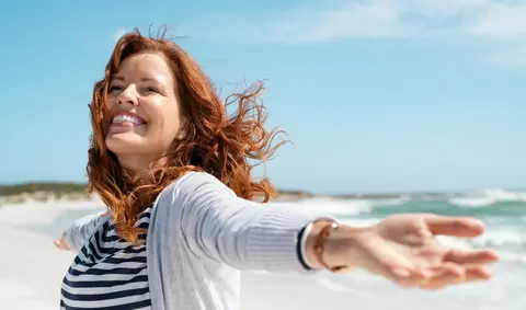 A smiling and carefree Middle aged woman