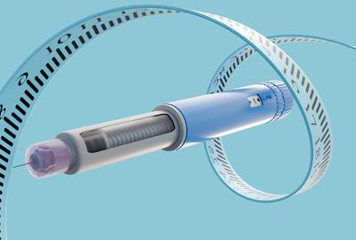 A measuring tape surrounding a GLP-1 injector