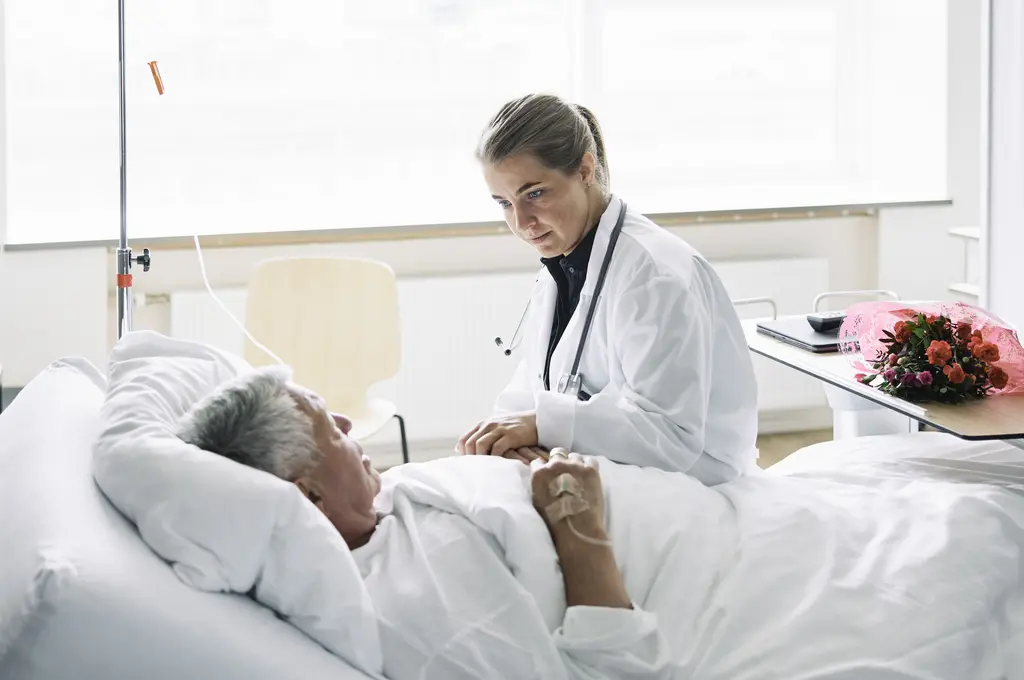 Doctor visiting patient in hospital
