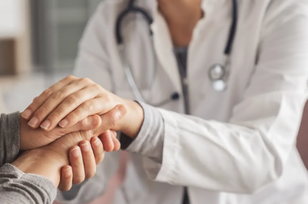 A comfortable and trustworthy handshake between doctor and patient