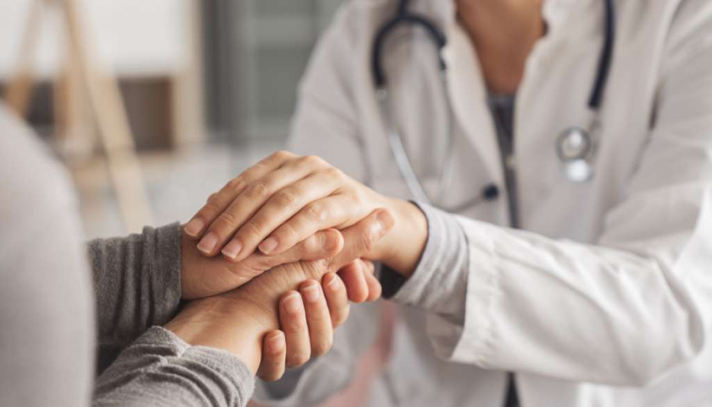 A comfortable and trustworthy handshake between doctor and patient