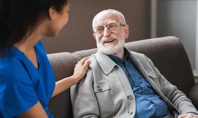 Three Rivers Concierge Medicine doctor comforting elderly male patient in St. Louis, MO