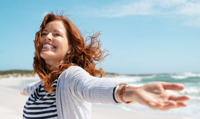 A smiling and carefree Middle aged woman